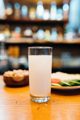 Traditional Turkish Alcoholic Drink Raki or Rakı with some appetizers at Restaurant in Turkey. Greek Ouzo in restaurant or cafe in Greece