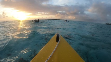 POV kayking on ocean at sunrise