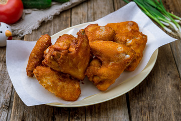 Buffalo chicken wings on a wooden background