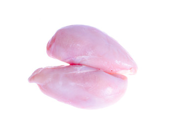 Two raw fresh chicken breasts isolated on white.