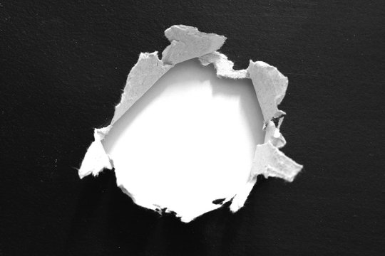 black torn paper