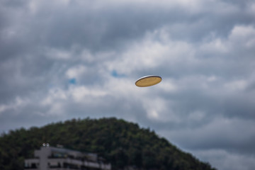 frisbee and clouds