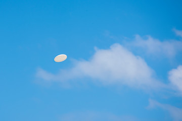 frisbee and clouds