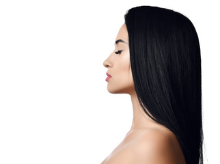 Portrait of woman brunette with long straight hair, bare shoulders, closed eyes and perfect lips. Advertisement concept