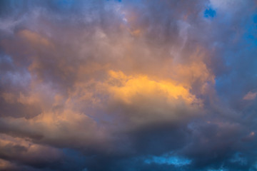 Naklejka na ściany i meble Beautiful sky at sunset with colored clouds