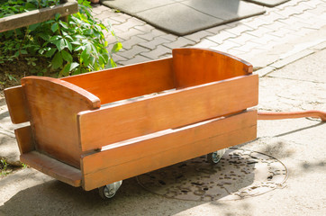 Chariot used for deliveries in nontraffic areas. A modern wooden barrow for any kind of transport