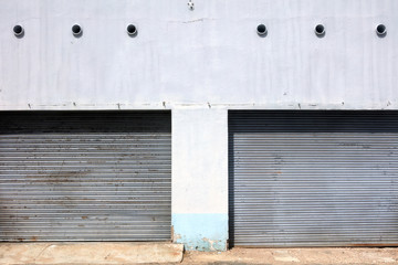 Fototapeta premium exterior view of close up warehouse roller doors