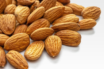 Almond nuts in white background