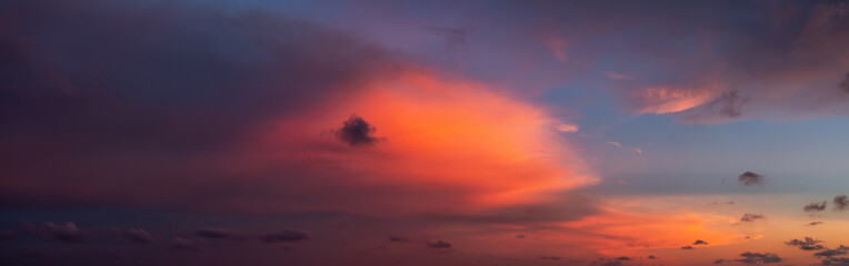 Dramatic Panoramic View of a cloudscape during a cloudy and colorful sunset. Taken over Beach Ancon...