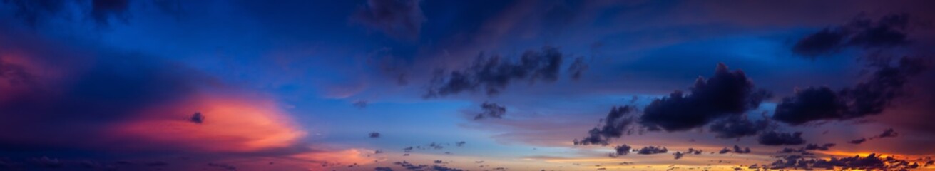 Dramatic Panoramic View of a cloudscape during a cloudy and colorful sunset. Taken over Beach Ancon...