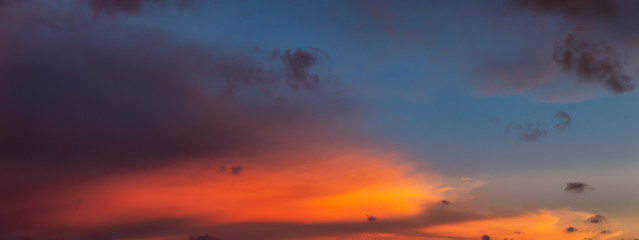 Dramatic Panoramic View of a cloudscape during a cloudy and colorful sunset. Taken over Beach Ancon...