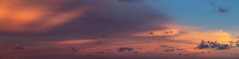 Dramatic Panoramic View of a cloudscape during a cloudy and colorful sunset. Taken over Beach Ancon...