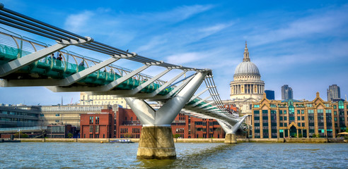 London, United Kingdom - April 18, 2019 - St. Paul's Cathedral across Millennium Bridge and the...