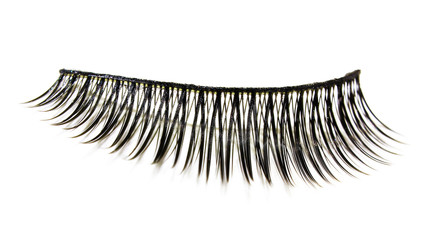 Beautiful black eyelash beauty, isolated on white background. Mascara with a natural effect. Professional glamorous makeup, eyelash extension concept.