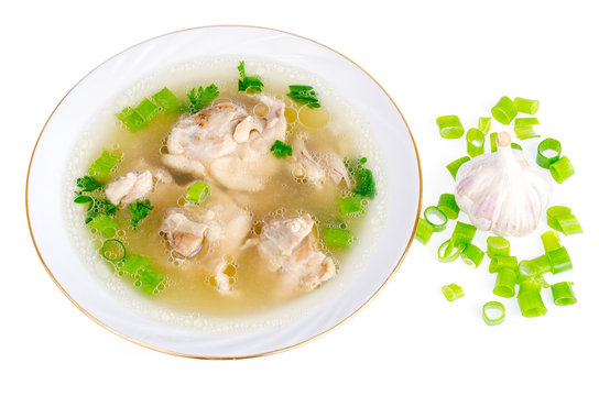 Broth with chicken meat Isolated on White background