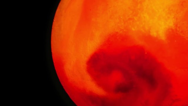 abstract red and green planet with moving surface wide