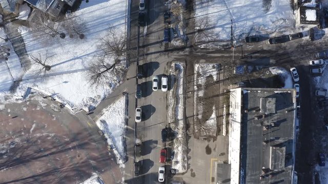 Aerial filming traffic on the central city street.