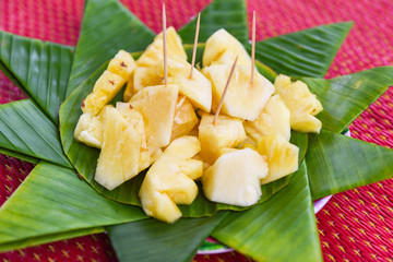 pineapple slice on banana leaf background fruit summer