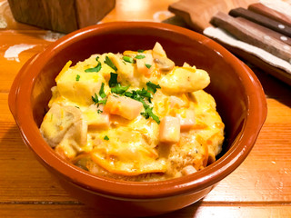 Potato vegetable pancakes with mushroom sauce. Photo