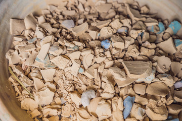 a lot of antique and dirty crockery of archeological interest