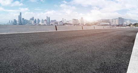 Road Asphalt Pavement and City  Architecture   Skyline