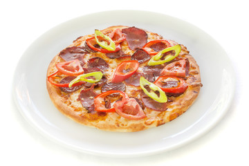 Delicious, tasty, fresh and italian pepperoni or margherita pizza isolated on white. View of mixed pizza in restaurant at napoli. Pizza on plate from top view.