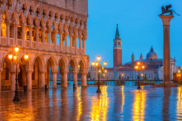 Piazza San Marco at night, view on venetian lion and san giorgio maggiore, Vinice, Italy
