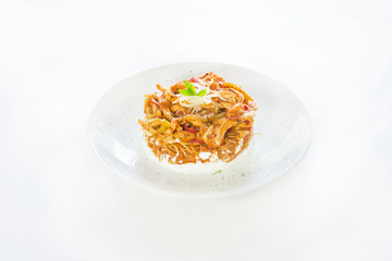 Traditional Turkish food cokertme kebab with chicken and yogurt.