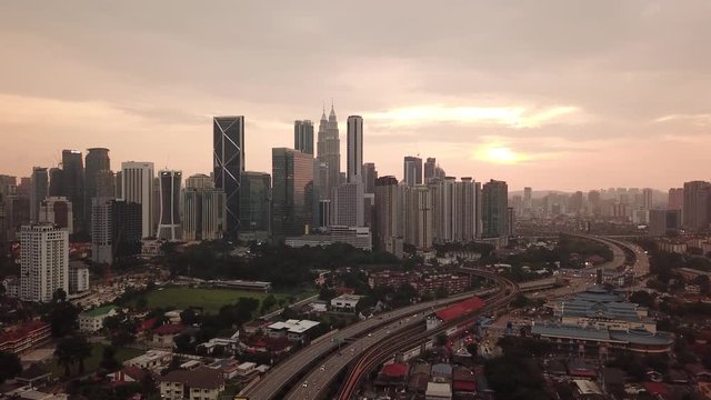 Kuala Lumpur, Malaysia - 1 July 2019: Aerial view of Kuala Lumpur city in Malaysia capital, tall buildings. Cinematic video of skyscrapers in big City.