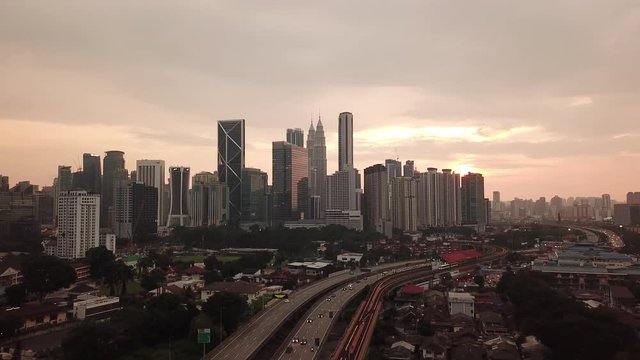 Kuala Lumpur, Malaysia - 1 July 2019: Aerial view of Kuala Lumpur city in Malaysia capital, tall buildings. Cinematic video of skyscrapers in big City.