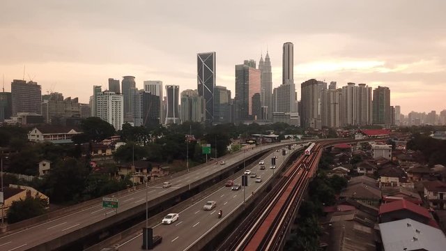 Kuala Lumpur, Malaysia - 1 July 2019: Aerial view of Kuala Lumpur city in Malaysia capital, tall buildings. Cinematic video of skyscrapers in big City.