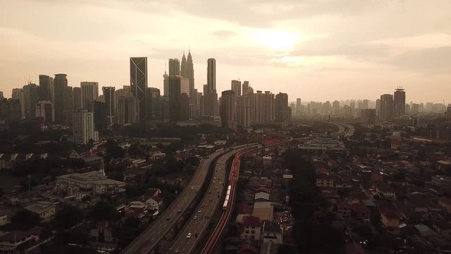 Kuala Lumpur, Malaysia - 1 July 2019: Aerial view of Kuala Lumpur city in Malaysia capital, tall buildings. Cinematic video of skyscrapers in big City.