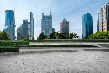 Urban skyscrapers with empty square floor tiles