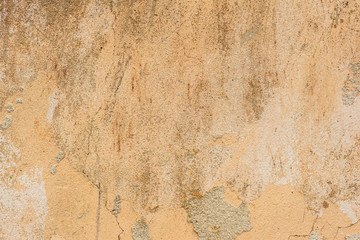 Texture of a concrete wall with cracks and scratches which can be used as a background