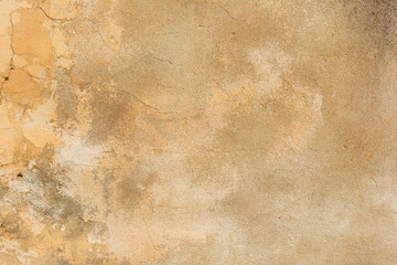 Texture of a concrete wall with cracks and scratches which can be used as a background