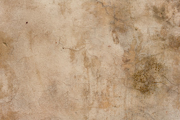 Texture of a concrete wall with cracks and scratches which can be used as a background