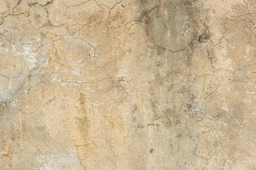 Texture of a concrete wall with cracks and scratches which can be used as a background
