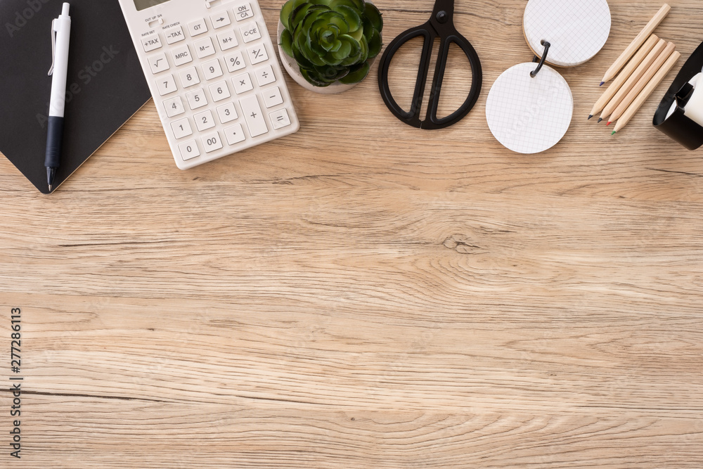 Poster top view office stationery on wooden table with copy space.student stuff on desk.education concept