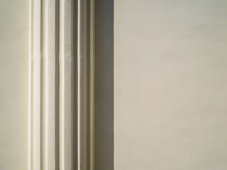 Plaster column on the wall of the old building