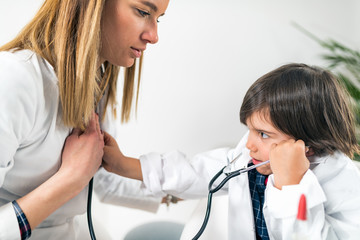 Little Boy Playing a Doctor in Doctor’s Office