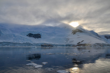 Cloudy sunset over Antarctic mountains