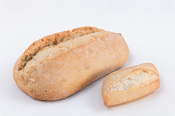 Two loaf of a delicious bread isolated on white. Close up