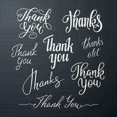 Vector set of handwritten inscriptions Thank You. Calligraphic lettering isolated on black background. Hand-drawn text for design of vintage thanks cards.
