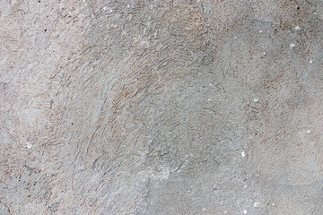 Dark plaster wall with dirty cracked scratched background. Old retro vintage brickwall with peel grey stucco texture