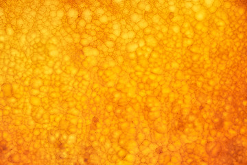 Onyx wall background. Texture of honey color onyx material