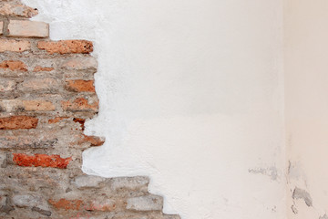 White plaster with old vintage red brick wall background