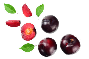 fresh plum fruit with green leaf and cut plum slices isolated on white background. top view