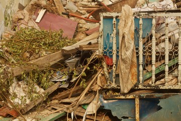 Garbage heap with beige and blue colors on the street in Jakarta, Indonesia