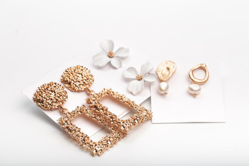 set of bright earrings isolated on white background