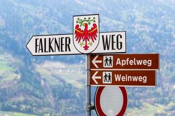 Signpost guiding to famous Falconer Road, in german, Falkner Weg, in Village Tyrol, Mountains...
